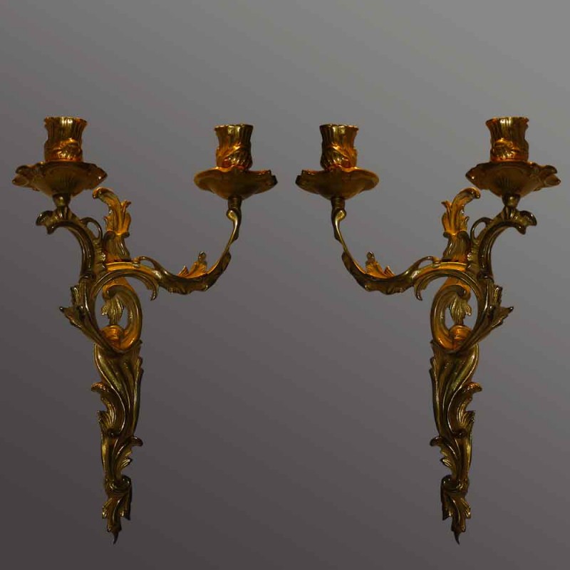 Pair of Louis XV style gilded bronze sconces