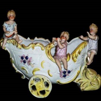 Cherubijnen porseleinen koekje eind 19e eeuw