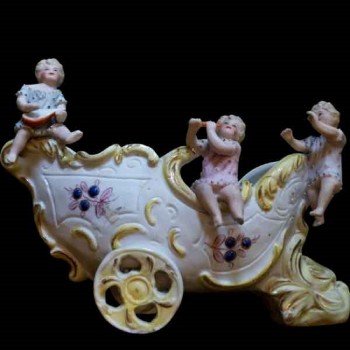 Cherubijnen porseleinen koekje eind 19e eeuw